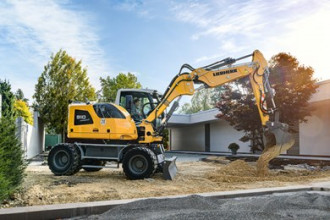 Mobilbagger Liebherr A 910 Compact 