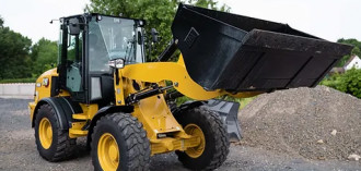 Radlader Caterpillar 908M 