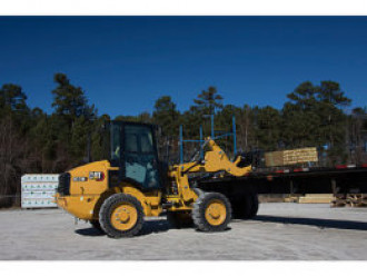 Radlader CAT 907M