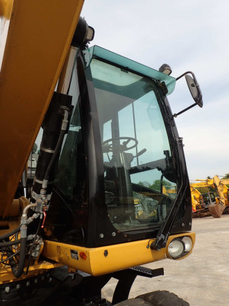 Umschlagbagger Caterpillar M 318 D MH