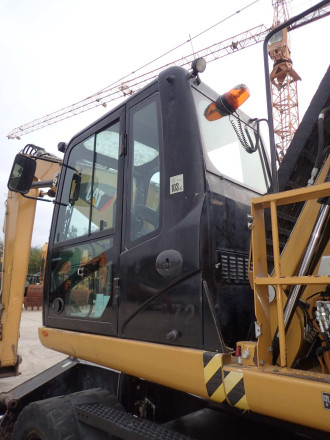 Umschlagbagger Caterpillar M 318 D MH