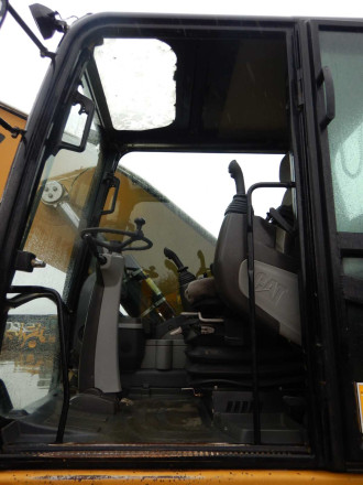 Umschlagbagger Caterpillar M 318 D MH