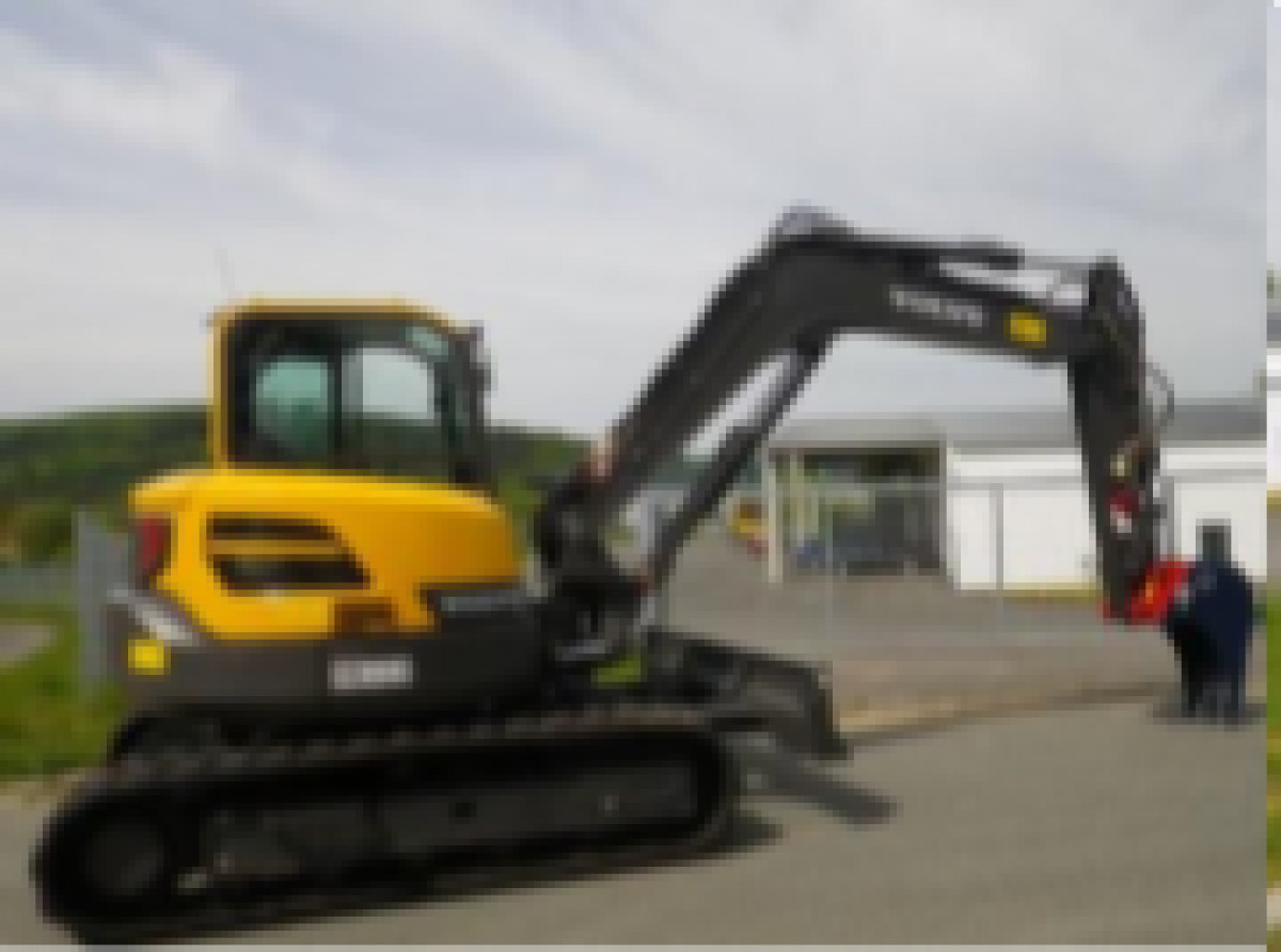 Bagger mit Sortiergreifer Volvo