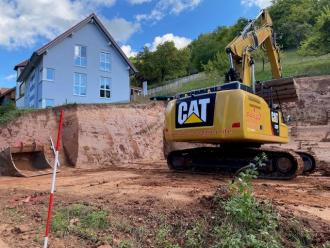 Kettenbagger mit Bedienpersonal, CAT 326 VA mit Oilquick 70/55
