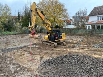 Kettenbagger mit Bedienpersonal, CAT 326 VA mit Oilquick 70/55