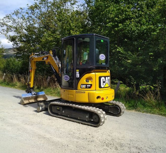 Hüllkreisbagger CAT 303 ECR 