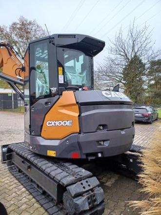 CX100E Midibagger mit Roadlinerketten , Schild und Verstellausleger