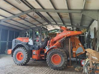 Radlader Hitachi ZW 150 - 5 mit Waage und Drucker